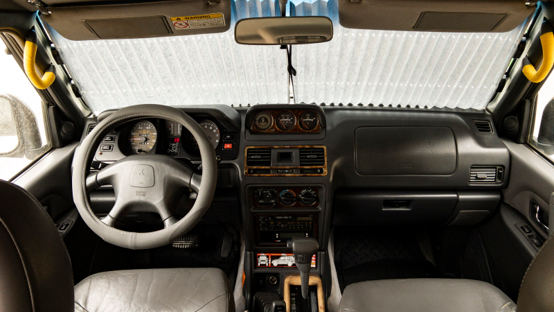Illustration for article titled How To Make A Cheap Steering Wheel Cover Look Not-Terrible